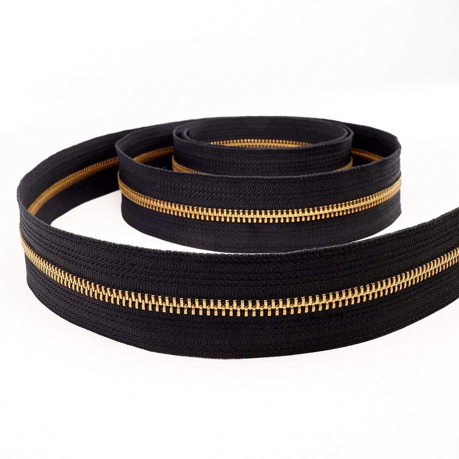 1640–5-black-ykk-metal-chain-zipper-tape-with-brass-teeth-5m-blk-b-1.jpg