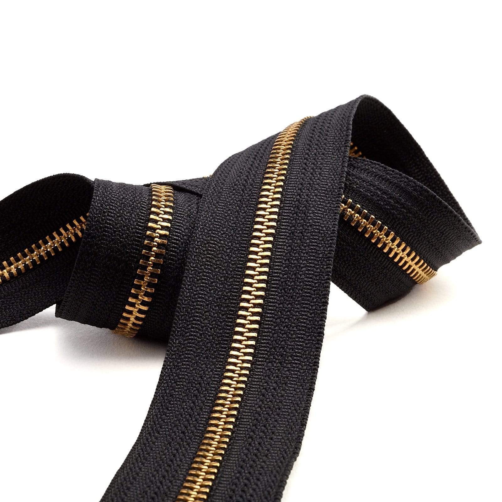 1640–5-black-ykk-metal-chain-zipper-tape-with-brass-teeth-5m-blk-b-1.jpg